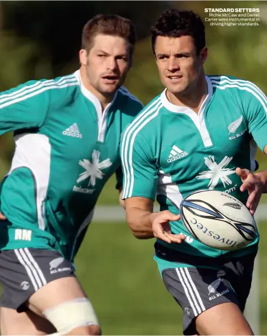  ??  ?? STANDARD SETTERS Richie McCaw and Daniel Carter were instrument­al in driving higher standards.