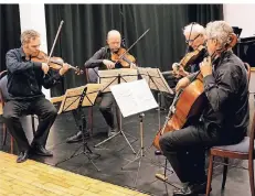 ?? RP-FOTO: HANS-PETER REICHARTZ ?? Das bekannte Streicher-Quartett bei seinem begeistert gefeierten Konzert im BIS-Kulturzent­rum.