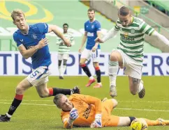  ??  ?? GAME CHANGER Rangers keeper Allan McGregor bravely blocks at feet of Leigh Griffiths in Old Firm clash last October