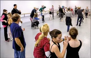  ?? Arkansas Democrat-Gazette/JOHN SYKES JR. ?? Members of the community cast run through their roles during a rehearsal held at a Little Rock studio.