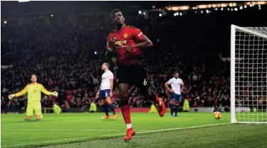  ?? File / Agence France-presse ?? ↑
Paul Pogba is likely to have played his last game for United after limping off during their defeat against Liverpool earlier this month with a calf injury.