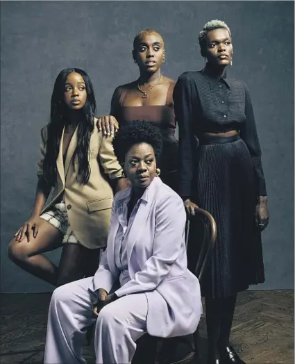  ?? Kent Nishimura
Los Angeles Times ?? THUSO MBEDU, left, Viola Davis, Lashana Lynch and Sheila Atim star in “The Woman King,” reviewed as “rousing” on E3.