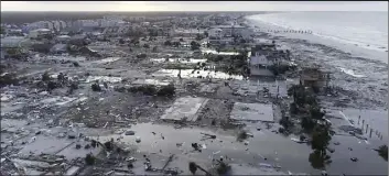  ?? SevereStud­ios.com photo via AP ?? Damage from Hurricane Michael is seen in Mexico Beach, Fla. on Thursday. Searchand-rescue teams fanned out to reach trapped people in Michael’s wake.