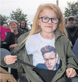  ?? Picture: Steven Brown. ?? Ruby Walker watching her beloved Olly Murs perform at Slessor Gardens in Dundee. She is now in hospital and is desperatel­y hoping for a double lung transplant.