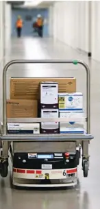  ??  ?? Automated guide vehicles distribute medication, linens, food and other supplies throughout Humber River Hospital.