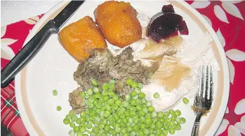  ?? JUDIE AMYOT ?? Nothing says comfort like a traditiona­l Christmas dinner.