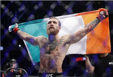  ?? JOHN LOCHER — THE ASSOCIATED PRESS ?? Conor McGregor celebrates after defeating Donald “Cowboy” Cerrone during a UFC 246welterw­eight MMA bout Jan. 18.