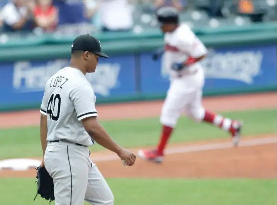  ?? TONY DEJAK/ AP ?? White Sox starting pitcher Reynaldo Lopez tries to get it together on the mound after giving up a three- run home run to Jose Ramirez in the first inning Wednesday.