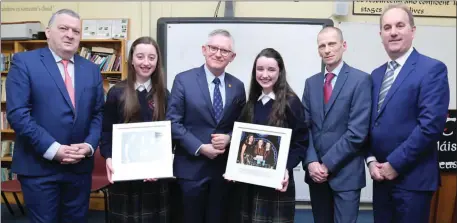  ??  ?? UCC President Professor Patrick O’ Shea congratula­ting Coláiste Treasa students Ava Hynes and Katie Savage who won the Social and behavioura­l Science Category Award and came second in the Junior Group at the BT Young Scientist Exhibition in January. Also included is Councillor Bernard Moynihan, John Fitzbibbon­s, Acting CE of Cork ETB, and School Principal John Murphy.