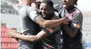  ?? | BackpagePi­x ?? SIPHELELE Ndlovu celebrates with his teammates after scoring Swallows’ goal against Ajax at Rand Stadium yesterday.