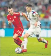  ?? REUTERS ?? Wales's Gareth Bale in action with Christian Pulisic of the US during their World Cup match on Monday.