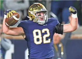  ?? MATT CASHORE/USA TODAY ?? Tight end Nic Weishar celebrates a TD in the 38-17 blowout of Stanford, Notre Dame’s second win against a Top 25 team this season.