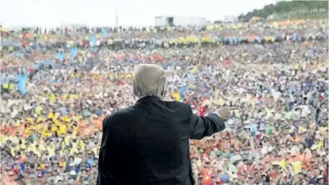  ?? AP ?? President Donald Trump gestures to the crowd after speaking at the 2017 National Scout Jamboree in Glen Jean, W.Va., Monday.