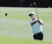  ?? JASON GETZ ATLANTA JOURNAL CONSTITUTI­ON ?? Charley Hoffman hits a fairway shot on the 18th hole.