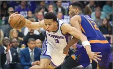  ?? HECTOR AMEZCUA/TRIBUNE NEWS SERVICE ?? The Sacramento Kings' Skal Labissiere (3) drives to the basket against the Phoenix Suns' TJ Warren (12) in Sacramento on Tuesday.