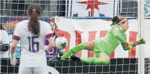  ?? CHRIS CARLSON THE ASSOCIATED PRESS ?? Canadian goalkeeper Stephanie Labbe blocks a shot during a game against the United States.