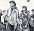  ??  ?? Photo Op from 2007 (top) and peace marchers with what became the CND logo