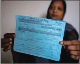  ?? ?? Jesmi Fatima shows a prescripti­on June 3 given by doctors to undergo pathology tests that were already delayed due to lack of supplies in Colombo.