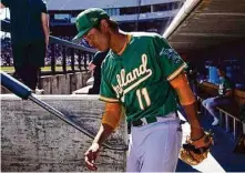  ?? Ashley Landis/Associated Press ?? Athletics starting pitcher Shintaro Fujinami had an up and down outing Sunday, walking five and striking out four.