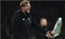  ?? EPA ?? Jurgen Klopp wants Liverpool to learn from Arsenal draw