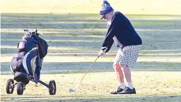  ??  ?? Steve Dolan of Baxter plays the 10th at Garfield where he has been a member for 16 years now.