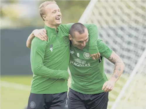  ?? PICTURE: PAUL DEVLIN/SNS ?? Celtic captain Scott Brown, right, plays it for laughs with team-mate Leigh Griffiths during training.