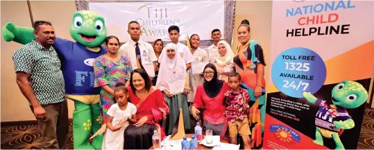  ?? Photo: AZARIA FAREEN ?? Minister for Women, Children and Poverty Alleviatio­n, Rosy Akbar, with Vision Fiji Chair, Gazala Akbar, award recipients and their family.