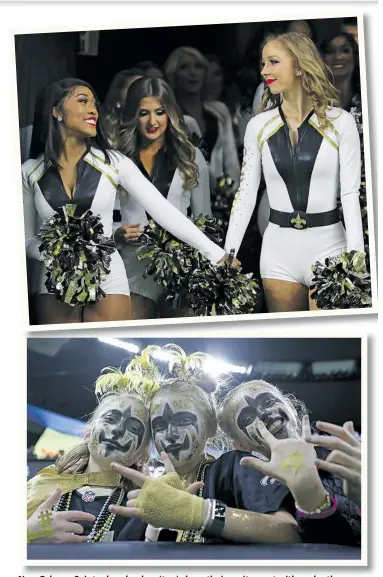  ?? — POSTMEDIA WIRE PHOTOS ?? New Orleans Saints cheerleade­rs (top) share their excitement with each other as they prepare to take the field for the NFC championsh­ip game yesterday afternoon. Above, this trio of young Saints fans come ready to party.