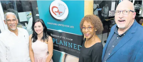  ?? PHOTOS BY RUDOLPH BROWN/PHOTOGRAPH­ER ?? Actress Ashley Bratcher (second left) of ‘Unplanned’ poses with from left, Major Richard Cooke, Claudette Cooke and producer Michael Manhardt at the Christians United for Life movie premiere at the Carib Cinema in Kingston, on Tuesday.