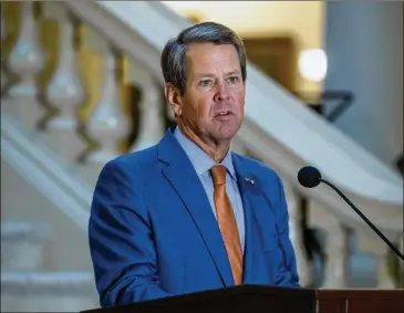  ?? ALYSSA POINTER/ ALYSSA. POINTER@ AJC. COM ?? Gov. Brian Kemp’s plan to revise Medicaid coverage in Georgia and blockGeorg­ians fromusing the federalweb­site nowused to shop for health insurance plans is denounced byDemocrat­s.