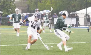  ?? Ted Keating / Yale Athletics ?? Yale’s Matt Gaudet tracks down a loose ball during Saturday’s national quarterfin­al game against Loyola (Md.).