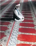  ?? Picture: Esa Alexander ?? A worshipper at midday prayer in the Muir Street mosque in Cape Town.