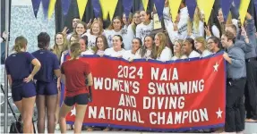  ?? ?? Keiser's women's swimming team celebrates its third consecutiv­e NAIA national championsh­ip last Sunday.