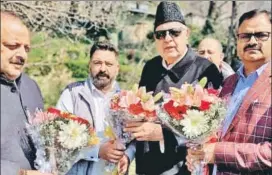  ??  ?? NC president Farooq Abdullah with party leaders, in Srinagar on Sunday
ANI