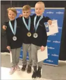  ?? Special to The Daily Courier ?? Preston Popoff, Chase Houston and Peyton Henry enjoyed success in the Level 1 boys division at provincial­s.