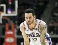  ?? JOHN AMIS — THE ASSOCIATED PRESS ?? Sixers guard JJ Redick spent much of Saturday’s first quarter in the dressing room but came back to play the rest of the night.