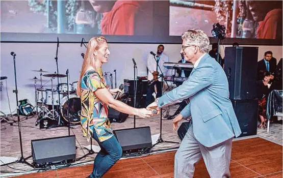  ?? Courtesy photo ?? Ria Gerger and David Gerger hit the dance floor after performing at the Story of Love gala benefiting the Zina Garrison Tennis Academy.