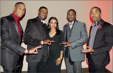  ??  ?? Kennedi Holt (center) with fraternity members Jerome Wonsley, Camron James, Darian Barnes and Cameron Palmer sharing the Kappa greeting