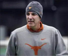  ?? RALPH BARRERA — AUSTIN AMERICAN-STATESMAN VIA AP ?? In this January 2018 photo, Texas men’s tennis coach Michael Center surveys the courts before the matches with UTSA, in Austin, Texas.