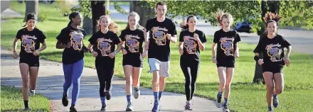  ?? RICK WOOD / MILWAUKEE JOURNAL SENTINEL ?? Milwaukee King athletes headed to the girls and boys state meets are, from left, Aitza Romero, Kaye Clark, Peyton Weiss, Maggie Froh, Louis Ketchman, Natalie Redding, Findlay Drabant, and Hannah Olenchek.