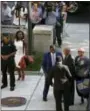  ?? ASSOCIATED PRESS ?? Bill Cosby arrives for his sexual assault trial with his wife Camille Cosby, right, at the Montgomery County Courthouse in Norristown on Monday.