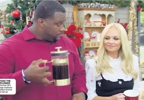  ??  ?? TAKE THE PLUNGER Former NFL star Anthony offers Emma a top-up