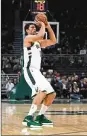  ??  ?? Brook Lopez hit a careerbest eight 3s and scored 28 points to help the Bucks beat Denver on Nov. 11.