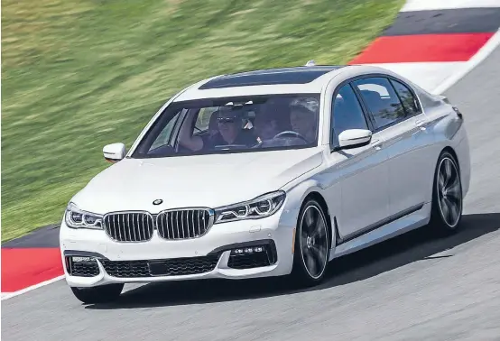  ??  ?? While the new 7-series is reposition­ed to the upper-end of the luxury market, the car has lost none of its sportiness, as this M-sport version demonstrat­es at the Monticello racetrack near New York.