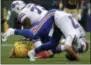  ?? MIKE ROEMER - THE ASSOCIATED
PRESS ?? Buffalo Bills’ Josh Allen is sacked during the second half of an NFL football game against the Green Bay Packers Sunday, Sept. 30, 2018, in Green Bay, Wis.