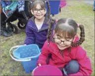  ??  ?? Anabelle and Ava Perez participat­ed in their first fish stocking Wednesday morning.