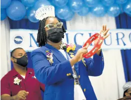  ?? GLADSTONE TAYLOR/MULTIMEDIA PHOTO EDITOR ?? Patsy Edwards-Henry, president of the Nurses Associatio­n of Jamaica, rattles a tambourine during praise and worship at the Nurses Week church service held at Mary Seacole House in Kingston on Sunday.