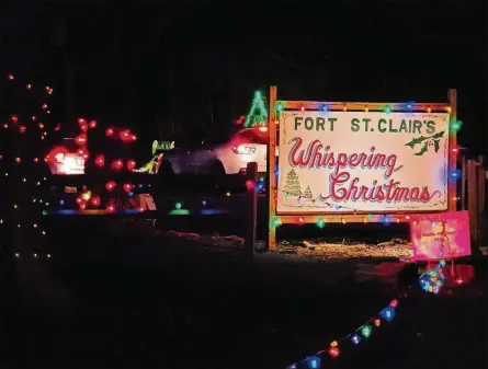  ?? PHOTOS BY NICK GRAHAM/ STAFF ?? Fort St. Clair Whispering Christmas drive-thru holiday light display is open 6-10 p.m. nightly through December 31. Fort St. Clair Park is located at 135 Camden Road in Eaton in Preble County.