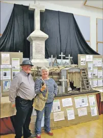  ??  ?? Ron Hetheringt­on and Helen Glennie at the Seil war memorial exhibition.