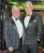  ?? Post-Gazette ?? New Pittsburgh Opera board chairman Gene Welsh, left, with his husband, Marty Healey, at the opera company’s 2019 Diamond Horseshoe Ball.